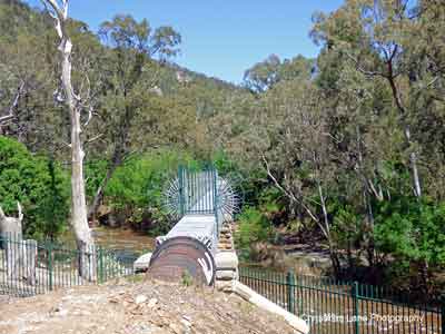 River Torrens, flowing under the Gorge Weir Aqueduct, Gorge Rd., Athelstone,
 SA.